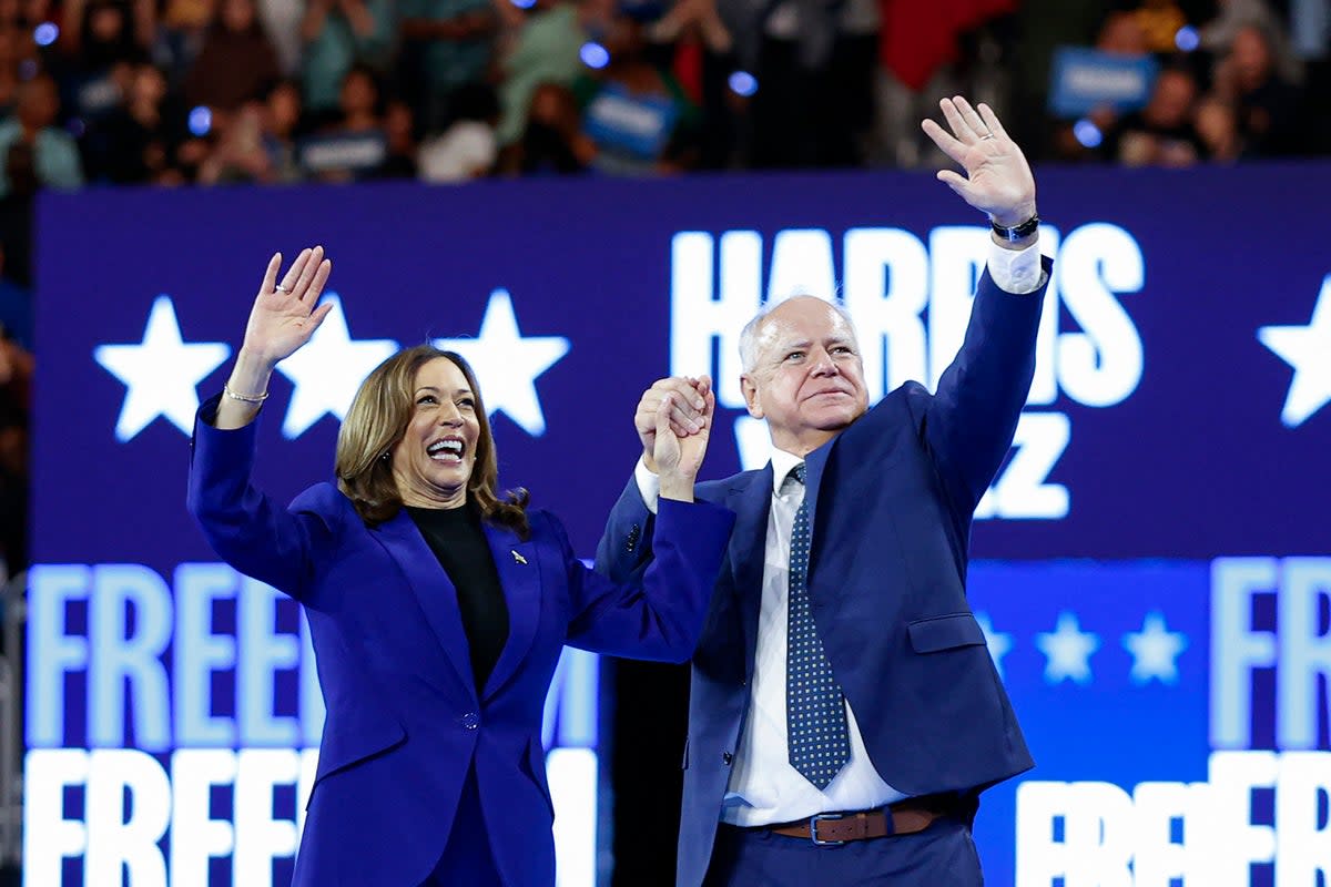 More than 200 Republicans who served as aides or officials to former presidents and senators endorsed Kamala Harris and Tim Walz  (AFP via Getty Images)