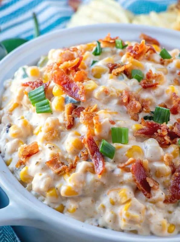 <p>The Country Cook</p><p>This takes the popular corn chip dip and adds the awesome flavors of a jalapeño popper.</p><p><strong>Get the recipe: <a href="https://www.thecountrycook.net/crock-pot-jalapeno-popper-corn-dip/" rel="nofollow noopener" target="_blank" data-ylk="slk:Crock Pot Jalapeno Popper Corn Dip;elm:context_link;itc:0;sec:content-canvas" class="link rapid-noclick-resp">Crock Pot Jalapeno Popper Corn Dip</a></strong></p>