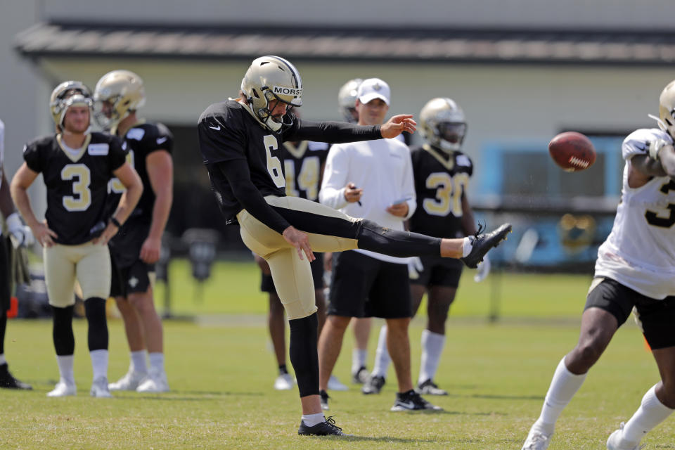 FILE - In this Aug. 1, 2019, file photo, New Orleans Saints' Thomas Morstead punts during the NFL football team's training camp in Metairie, La. Between Morstead placing punts just short of opponents’ goal lines and diminutive returner Deonte Harris deftly darting away from tacklers, the Saints like the way their special teams have influenced the outcomes of games. (AP Photo/Gerald Herbert, File)