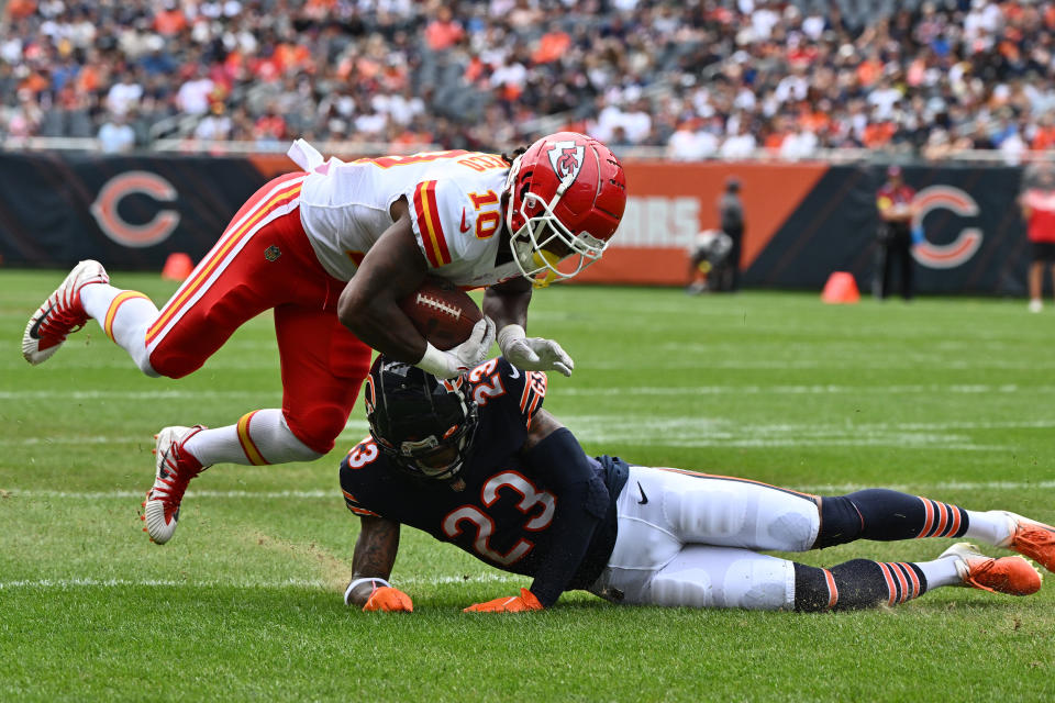 Aug 13, 2022; Chicago, Illinois, USA; Kansas City Chiefs running back Isiah Pacheco (10) is taken down by Chicago Bears defensive back <a class="link " href="https://sports.yahoo.com/nfl/players/31002" data-i13n="sec:content-canvas;subsec:anchor_text;elm:context_link" data-ylk="slk:Lamar Jackson;sec:content-canvas;subsec:anchor_text;elm:context_link;itc:0">Lamar Jackson</a> (23) in the first quarter at Soldier Field. Mandatory Credit: Jamie Sabau-USA TODAY Sports