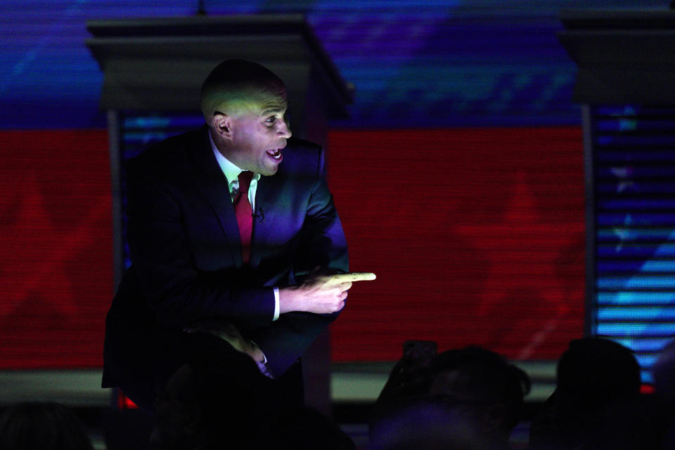 Democratic presidential candidate Sen. Cory Booker, D-N.J., greets supporters Thursday, Sept. 12, 2019, during a Democratic presidential primary debate hosted by ABC at Texas Southern University in Houston. (AP Photo/David J. Phillip)