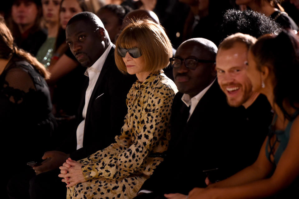 Anna Wintour and Edward Enninful watch from the front row during the Fashion For Relief catwalk show [Photo: Getty Images]