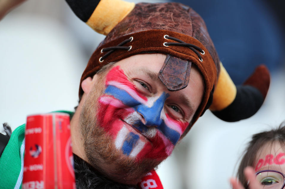 A Norway fan in a viking hat with the national flag painted on his face during the 2019 FIFA Women's World Cup France group A match between Norway and Nigeria at Stade Auguste Delaune on June 8, 2019 in Reims, France. (Photo by Charlotte Wilson/Offside/Getty Images)