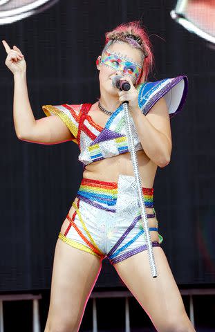 <p>Frazer Harrison/Getty</p> JoJo Siwa performs onstage during LA Pride in the Park on June 8, 2024