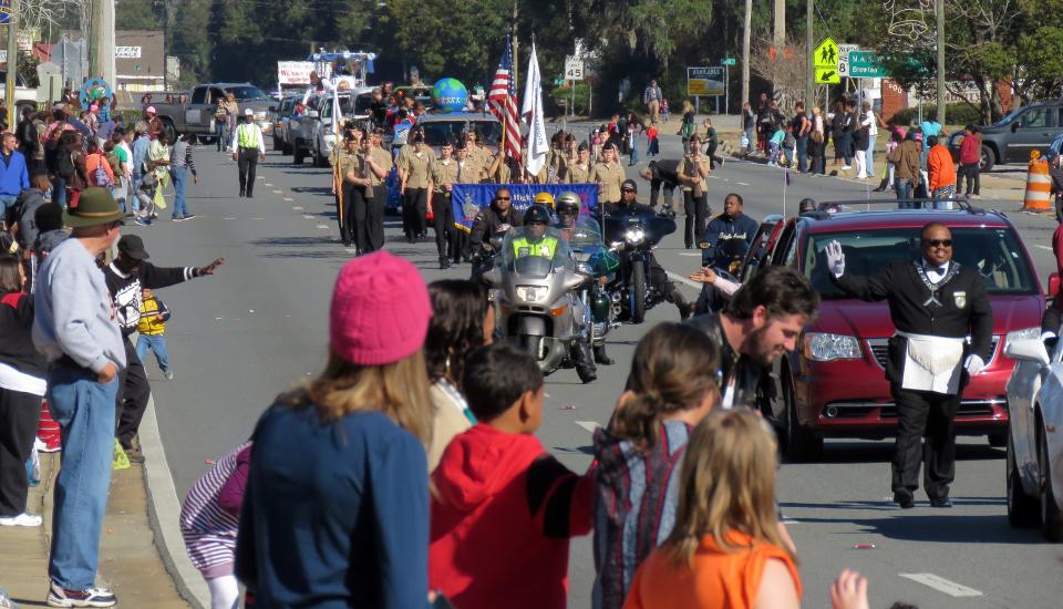 A past Martin Luther King, Jr. Parade in Milton winds its way down Stewart Street. This year's Milton and Cantonment parades get underway Monday.