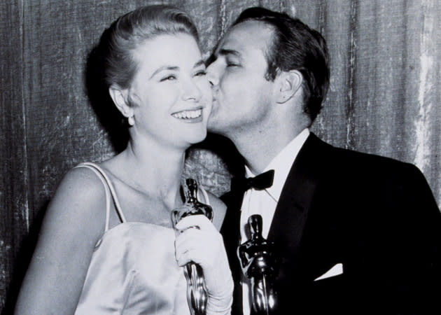 <b>Brando and Kelly</b><br><br> The year that Elia Kazan’s ‘On the Waterfront’ dominated the awards, winning Best Picture, Director, Supporting Actress and Actor for Marlon Brando, pictured with Best Actress Grace Kelly (for ‘The Country Girl). Both were upsets, with Bing Crosby and Judy Garland considered favourites.
