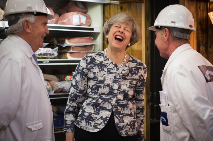 Theresa joked with Smithfield workers (Picture: PA)