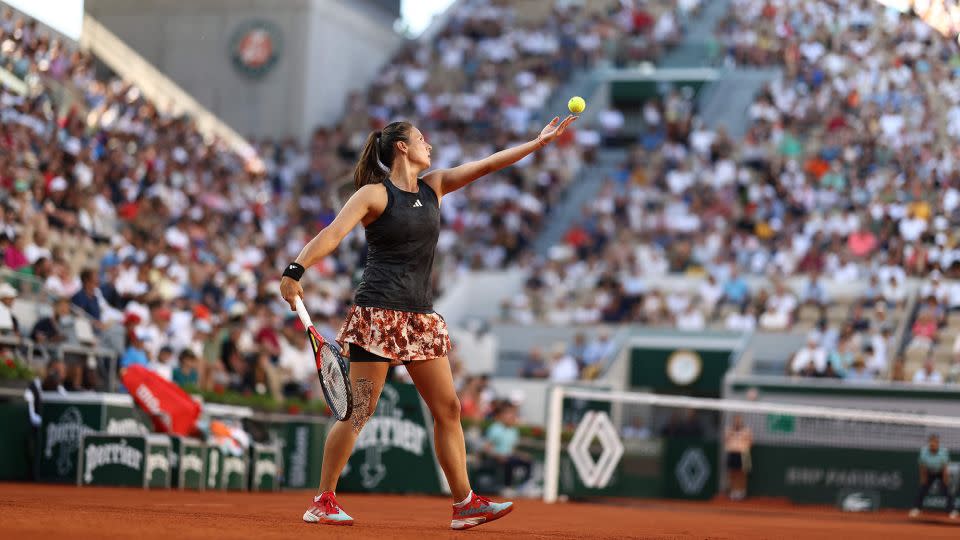 Kasatkina serves to Elina Svitolina at the French Open earlier this month. - Thomas Samson/AFP/Getty Images