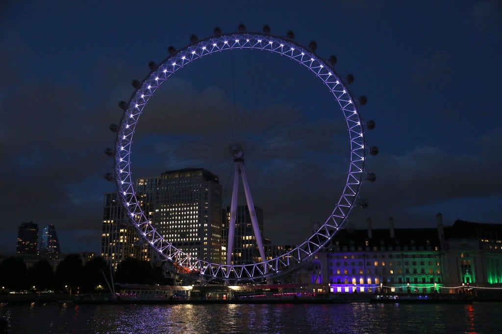 The London Eye turns purple to celebrate the opening of the Elizabeth line (Mayor of London)