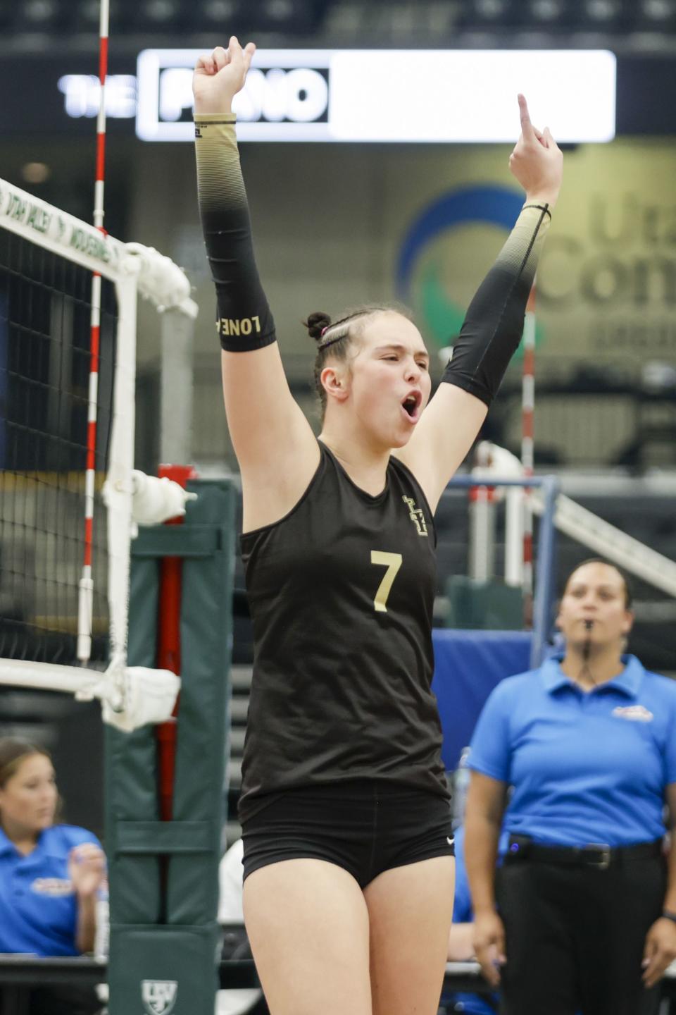 The Lone Peak Knights’ Zoey Burgess celebrates after scoring a point against the Mountain Ridge Sentinels in the 6A finals in Orem on Saturday, Nov. 5, 2022. The Lone Peak Knights won 3-1 in sets. | Ben B. Braun, Deseret News