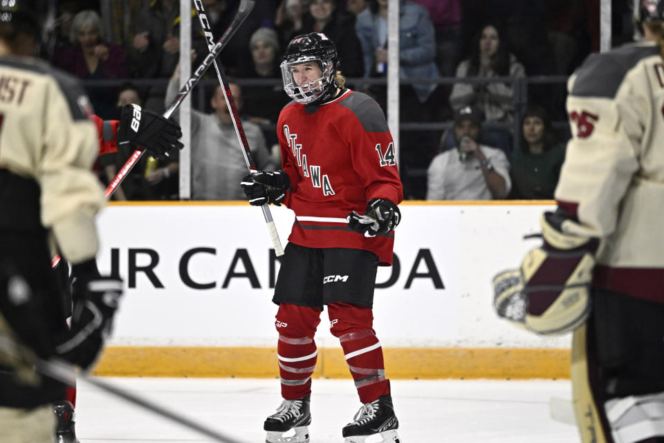 Ottawa's Hayley Scamurra (14) celebrates her goal on Montreal during the second period of a PWHL hockey game Tuesday, Jan. 2, 2024, in Ottawa, Ontario. (Justin Tang/The Canadian Press via AP)