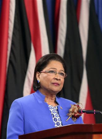 Trinidad and Tobago's Prime Minister and chairperson of the Caribbean Community (CARICOM) Kamla Persad-Bissessar addresses a media conference at the Diplomatic Centre in St Ann's, on the outskirts of the capital Port-of-Spain November 26, 2013. REUTERS/Andrea De Silva