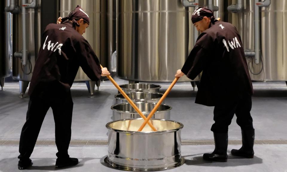 <span>Brewing sake from rice, the traditional Japanese way.</span><span>Photograph: Berry Bros & Rudd</span>