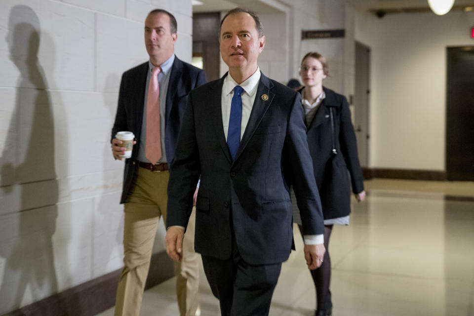 House Intelligence Committee Chairman Rep. Adam Schiff, of Calif., center, arrives for a closed door meeting where Ambassador William Taylor, Jr. will testify as part of the House impeachment inquiry into President Donald Trump, on Capitol Hill in Washington, Tuesday, Oct. 22, 2019. (AP Photo/Andrew Harnik)