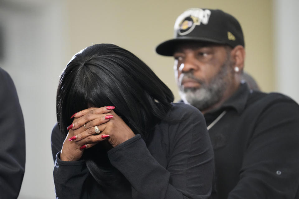 RowVaughn Wells, mother of Tyre Nichols, who died after being beaten by Memphis police officers, cries at a news conference in Memphis, Tenn., Monday, Jan. 23, 2023. Behind is Tyre's stepfather Rodney Wells. (AP Photo/Gerald Herbert)