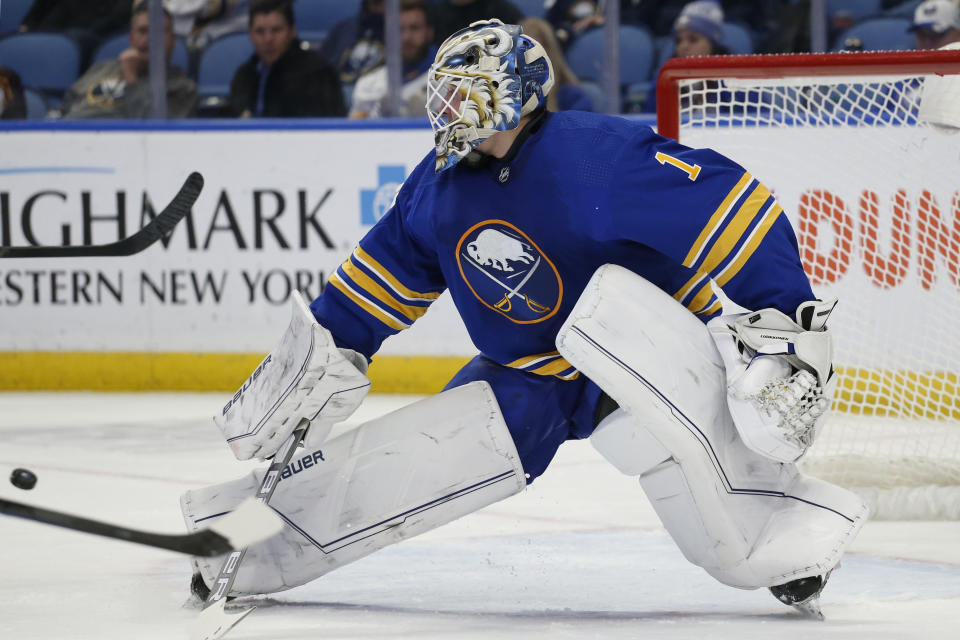 Buffalo Sabres goaltender Ukko-Pekka Luukkonen (1) makes a save during the second period of an NHL hockey game against the Anaheim Ducks, Tuesday, Dec. 7, 2021, in Buffalo, N.Y. (AP Photo/Jeffrey T. Barnes)