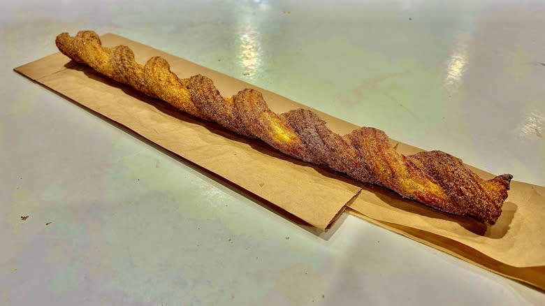 Long churro on paper