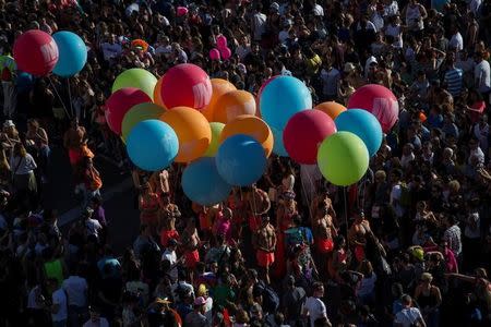 Revellers attend the World Pride parade in Madrid, Spain, July 1, 2017. REUTERS/Juan Medina