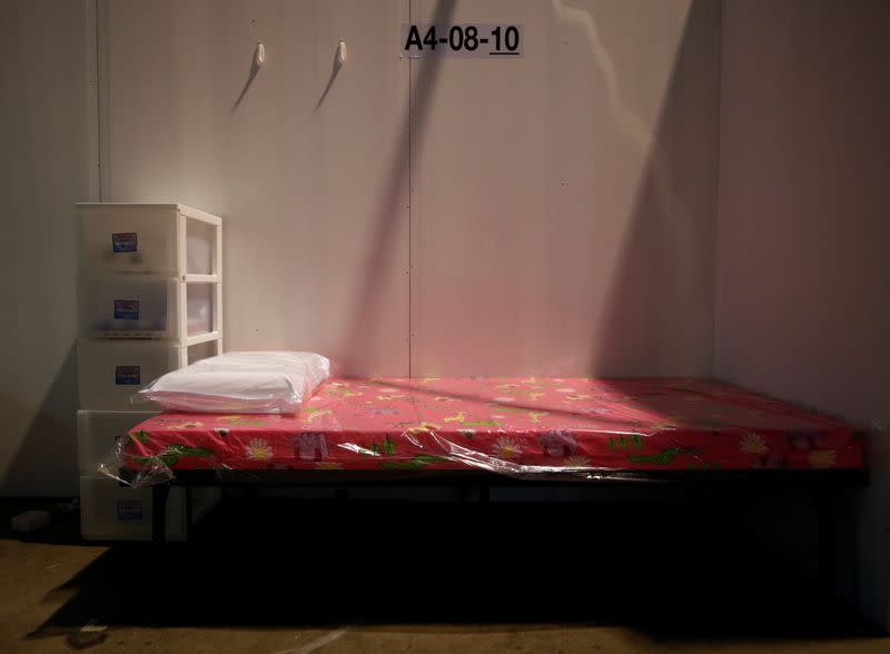 A view of a bed at Changi Exhibition Centre which has been repurposed into a community isolation facility that will house recovering or early COVID-19 patients with mild symptoms, in Singapore