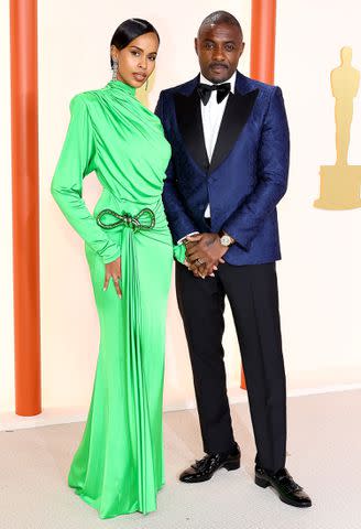 <p>Arturo Holmes/Getty Images</p> (L-R) Sabrina Dhowre Elba and Idris Elba attend the 95th Annual Academy Awards on March 12, 2023