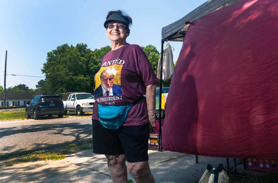 Kathy Levinger poses for a portrait in Selma, N.C. while shopping at the 301 Endless Yard Sale Friday, June 14, 2024.