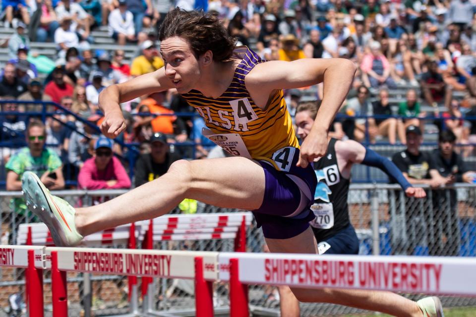 OLSH's Antonio Votour leaps to a 14.62 qualifying time in the 2A 110-meter hurdles prelims at the PIAA Track and Field Championships at Shippensburg University Friday, May 26, 2023.