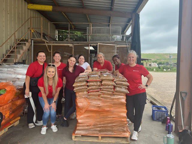 <p>Robert Half</p> The Robert Half Houston team volunteers at the Humane Society in April.