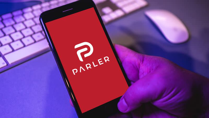 The Parler app pictured on a phone screen. The social platform is teasing a return next month.