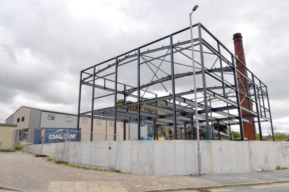 Bradford Telegraph and Argus: The under construction restaurant with the industrial units next to it.