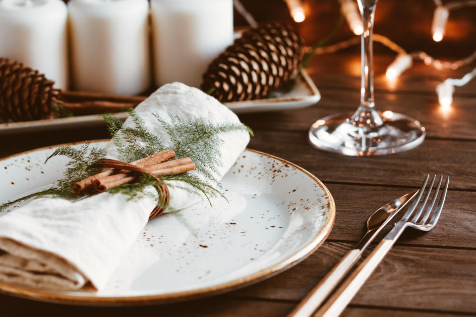 Setting an empty place at the table is one way to honor a lost loved one this holiday season. (Photo: Getty Images)