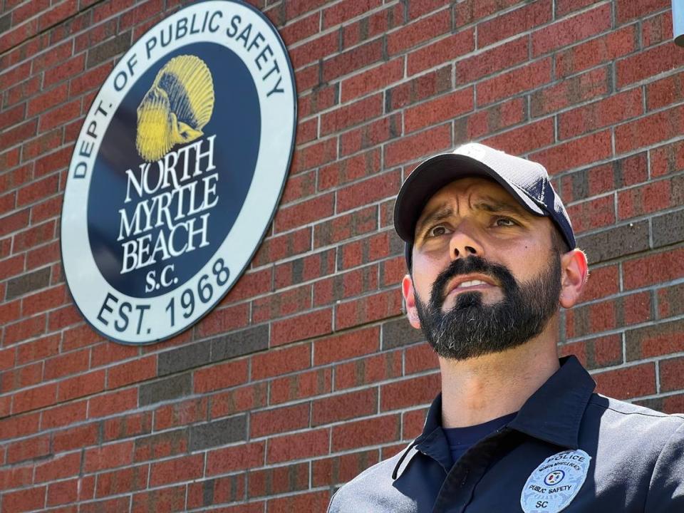 Pat Wilkinson, a North Myrtle Beach public information officer and K-9 handler, gives a press conference on Monday about the discovery of an infant child found under bushes in North Myrtle Beach and the arrest of the child’s mother, Britney Wheatle, a 21-year-old student from Jamaica working in the U.S. under a J-1 student visa.