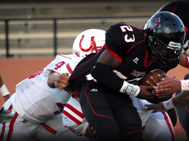 The Tascosa football team competing against a former, more nearby district rival — TascosaRebelSports.com