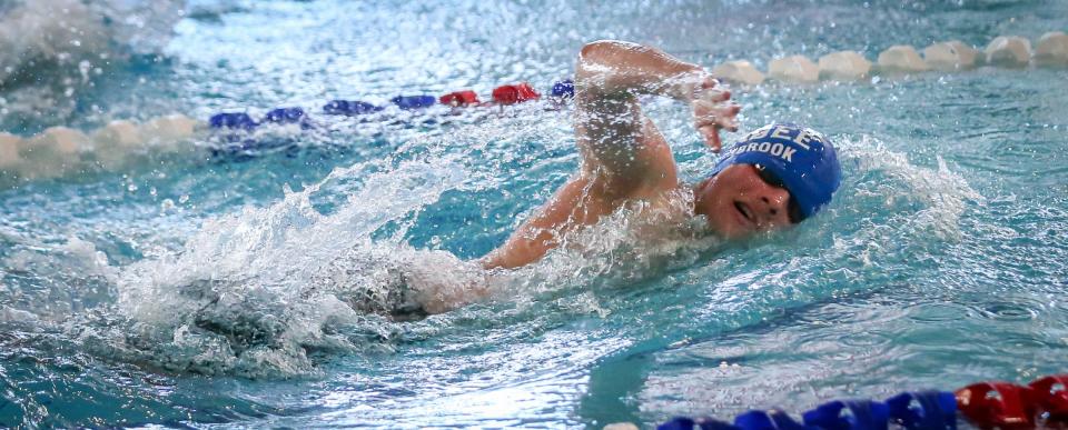 Dundee's TK Westbrook swims to a win in the 200-yard freestyle during the Monroe County Championship Saturday, February 4, 2023 at Dundee High School.