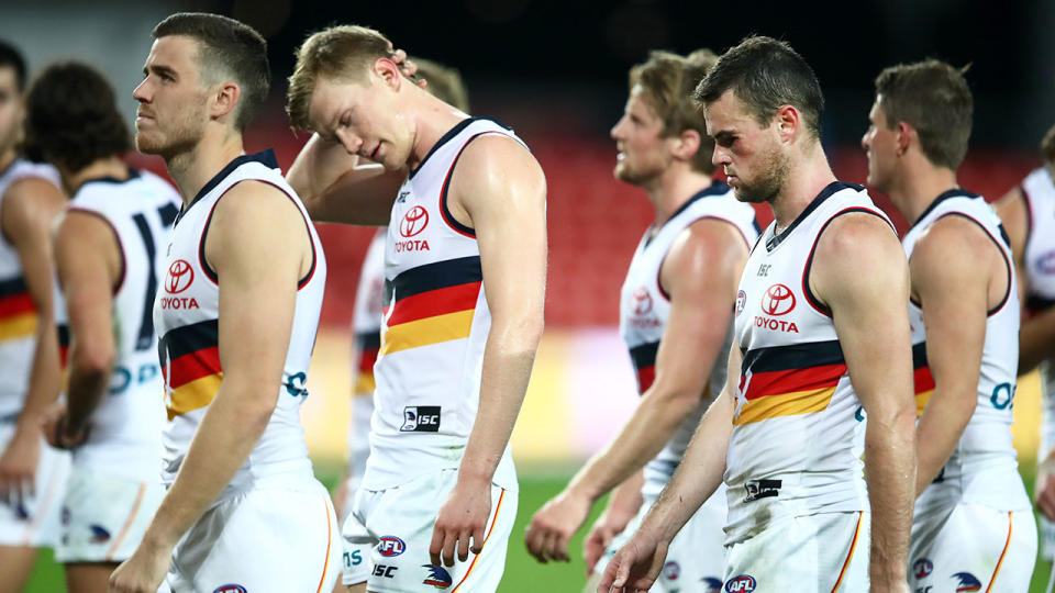 Pictured here, the Adelaide Crows after their defeat to Gold Coast.