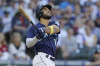 Seattle Mariners' Abraham Toro follows through on an RBI-single that scored Cal Raleigh during the second inning of a baseball game against the Chicago White Sox, Monday, Sept. 5, 2022, in Seattle. (AP Photo/Ted S. Warren)