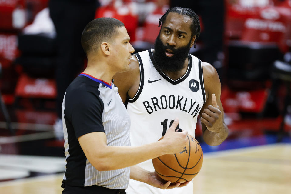 PHILADELPHIA, PENNSYLVANIA - FEBRUARY 06: James Harden #13 of the Brooklyn Nets speaks with referee Nate Green #65 during the first quarter at Wells Fargo Center on February 06, 2021 in Philadelphia, Pennsylvania. NOTE TO USER: User expressly acknowledges and agrees that, by downloading and or using this photograph, User is consenting to the terms and conditions of the Getty Images License Agreement. (Photo by Tim Nwachukwu/Getty Images)