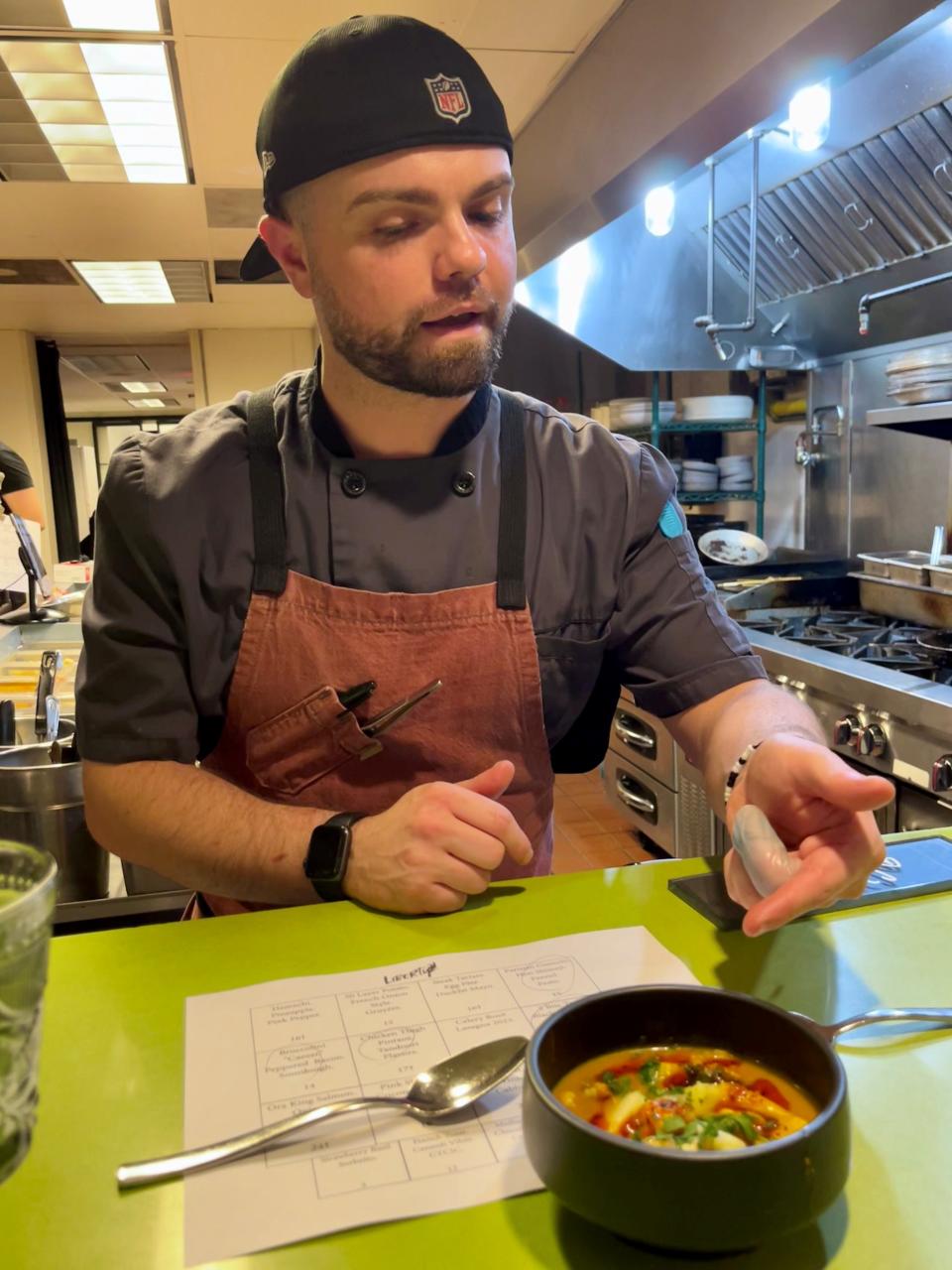 Chef Richee Boye describes one of his savory dishes at Liberty.