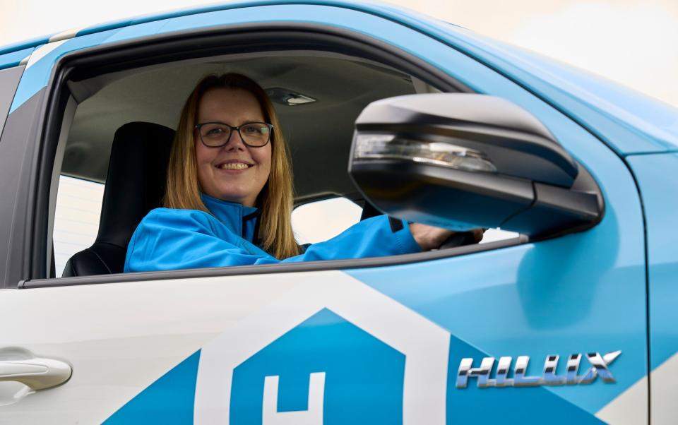 Engineer Katherine Chamberlain behind the wheel of the Hilux