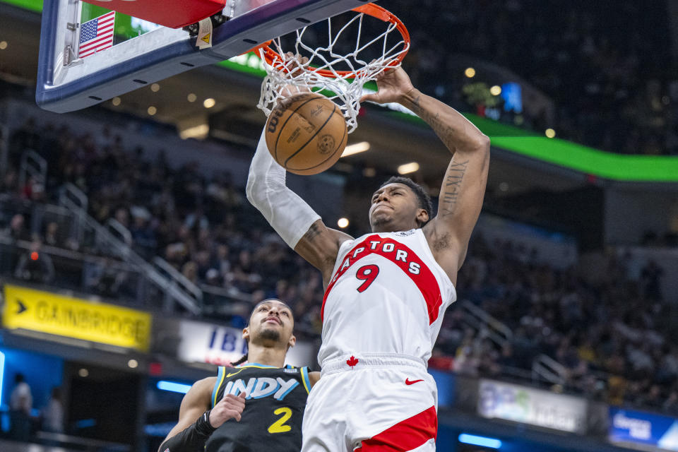 Toronto Raptors guard RJ Barrett (9) dunks during the second half of an NBA basketball game against the Indiana Pacers in Indianapolis, Monday, Feb. 26, 2024. (AP Photo/Doug McSchooler)