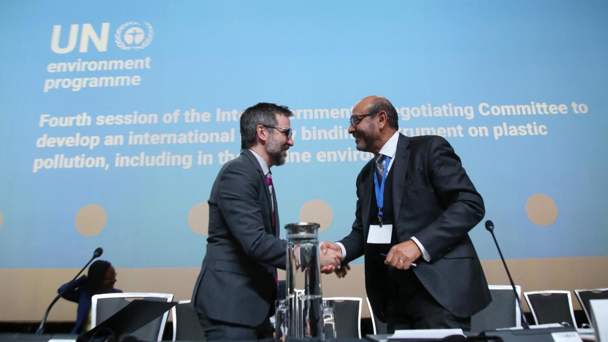  INC-4 chairman Luis Vayas Valdivieso (right) shakes hands with Canada's Minister of Environment and Climate Change Steven Guilbeault during the fourth session of the UN Intergovernmental Negotiating Committee on Plastic Pollution in Ottawa, Canada, on April 23, 2024. 