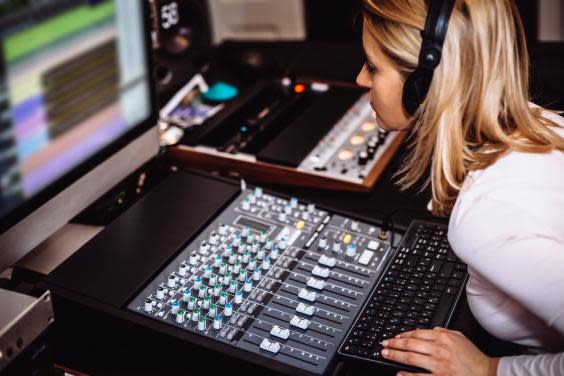 Long-term solutions are needed to get more women into music production (Getty/iStock)