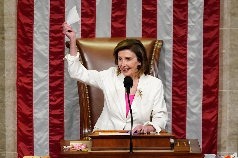 Speaker of the House Nancy Pelosi, D-Calif., presides over House passage of President Joe Biden's expansive social and environment bill, at the Capitol in Washington, Friday, Nov. 19, 2021.