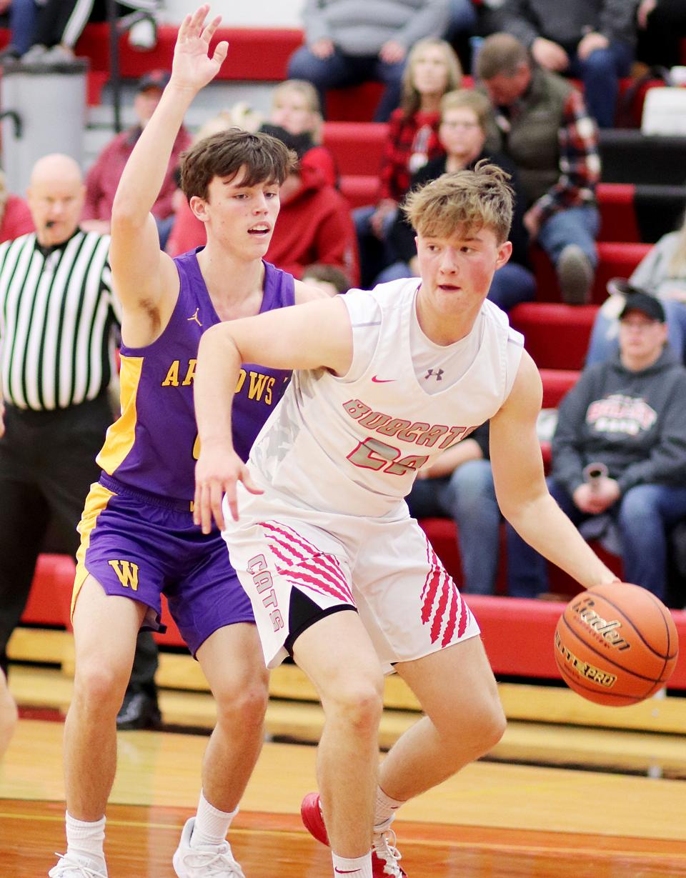 Watertown's Jack Heesch defends against Brookings' Nathan Lease during their season-opening Eastern South Dakota Conference boys basketball game on Friday, Dec. 9, 2022 at Brookings.
