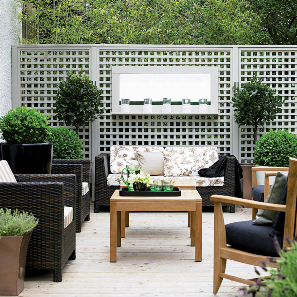 Zone your space, create privacy or encourage climbing plants with these garden trellis ideas