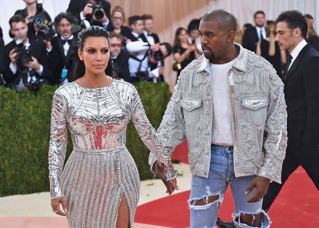<p>Mike Coppola/Getty</p> Kim Kardashian and Kanye West in May 2016