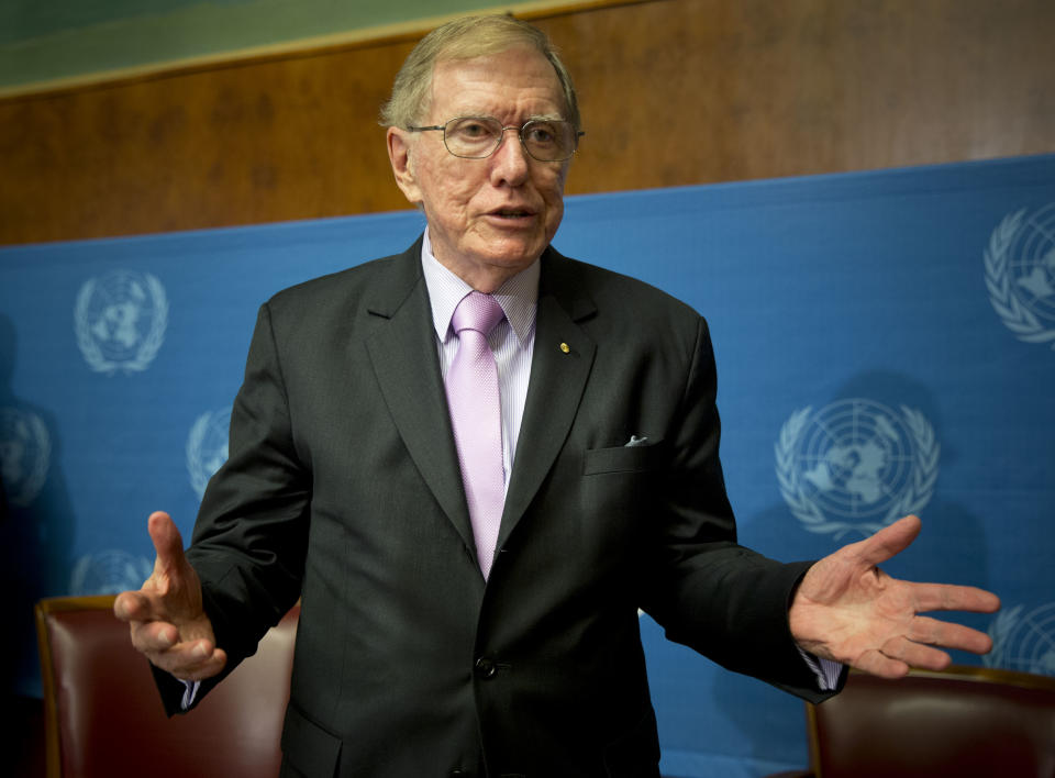 Retired Australian judge Michael Kirby, chairperson of the commission of Inquiry on Human Rights in the Democratic People's Republic of Korea, gestures after delivering the commission's report during a press conference at the United Nations in Geneva, Switzerland, Monday, Feb. 17, 2014. A U.N. panel has warned North Korean leader Kim Jong Un that he may be held accountable for orchestrating widespread crimes against civilians in the secretive Asian nation. Kirby told the leader in a letter accompanying a yearlong investigative report on North Korea that international prosecution is needed "to render accountable all those, including possibly yourself, who may be responsible for crimes against humanity." (AP Photo/Anja Niedringhaus)