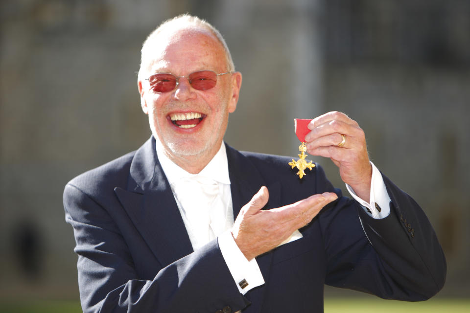 Radio DJ 'Whispering' Bob Harris poses after receiving his Officer of the British Empire (OBE) from the Princess Anne, Princess Royal at Windsor Castle on 20 October. Lucky him, he also took second place in a new award - Hairy Tweeter of the Year 2011.