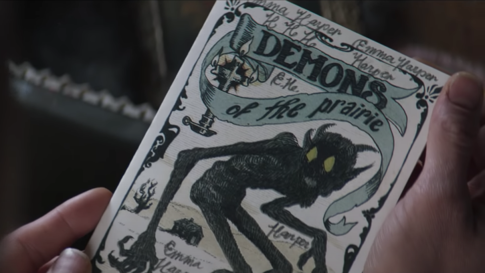 An image of a pamphlet with a demon on the cover in the movie The Wind