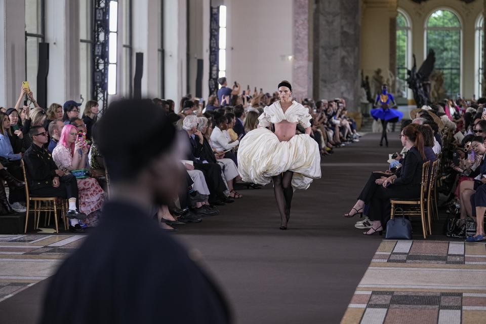 A model wears a creation for the Schiaparelli Haute Couture Fall/Winter 2023-2024 fashion collection presented in Paris, Monday, July 3, 2023. (AP Photo/Michel Euler)