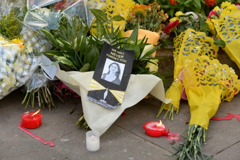 Flowers were placed at the Great Siege monument in Valletta, Malta, on Thursday as a tribute to the murdered investigative journalist Daphne Caruana Galizia and tributes lay at the foot of the Great Siege monument in Valletta, Malta on October 19, 2017 which has been turned into a temporary shrine for Maltese journalist and blogger Daphne Caruana Galizia who was killed by a car bomb outside her home in Bidnjia, Malta, on October 16, 2017